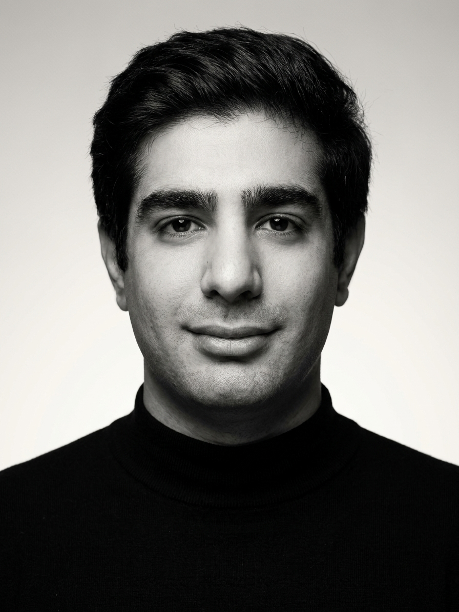 Black-and-white portrait of Amir Hossein Khatami